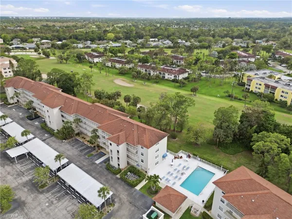 an aerial view of a house with a garden