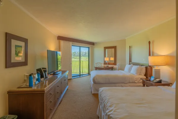 a room with furniture and a window