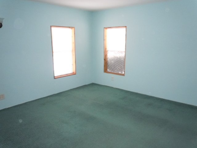 10948 Moate Road Durand, IL 61024 - Photo 7 of 12 an empty room with a window