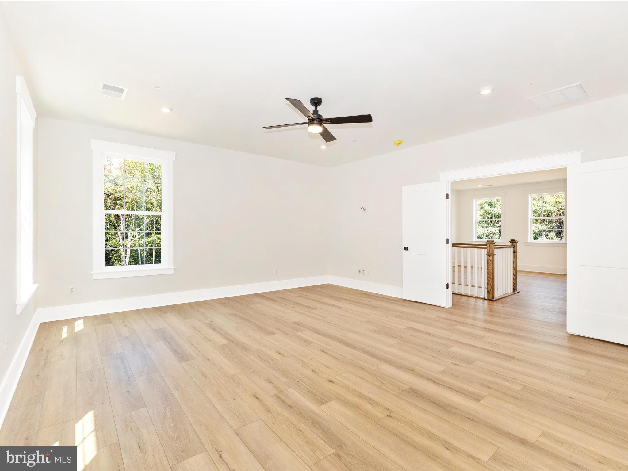 3105 Sumantown Road Middletown, MD 21769 - Photo 25 of 45 wooden floor in an empty room with a window
