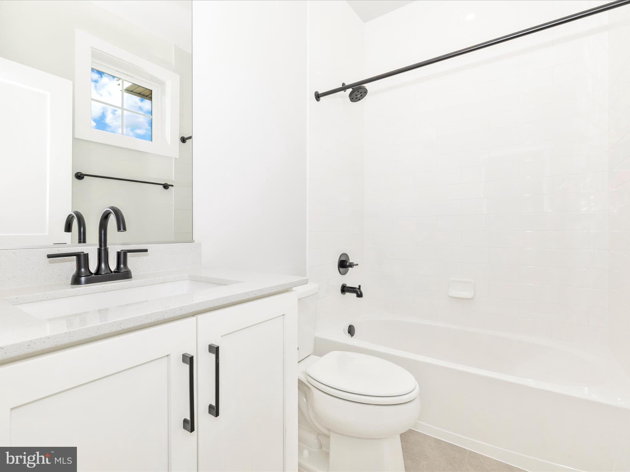 3105 Sumantown Road Middletown, MD 21769 - Photo 37 of 45 a bathroom with a sink a toilet and shower