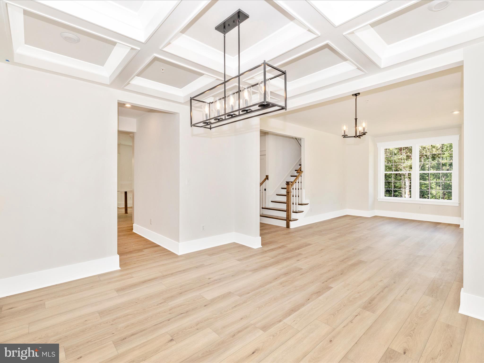 3105 Sumantown Road Middletown, MD 21769 - Photo 10 of 45 a view of an empty room with wooden floor and windows