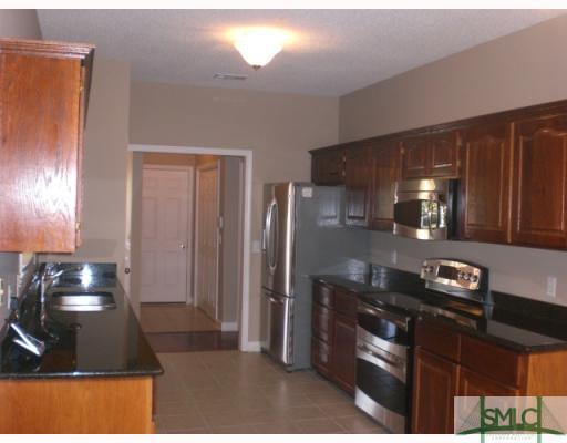 107 Legends Road Pooler, GA 31322 - Photo 4 of 8 Kitchen. New Granite Countertops, Stainless Steel