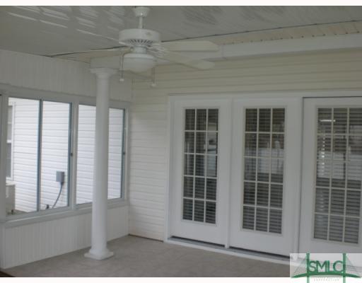 107 Legends Road Pooler, GA 31322 - Photo 8 of 8 Other. Sunroom, with ceramic tile and full gutter