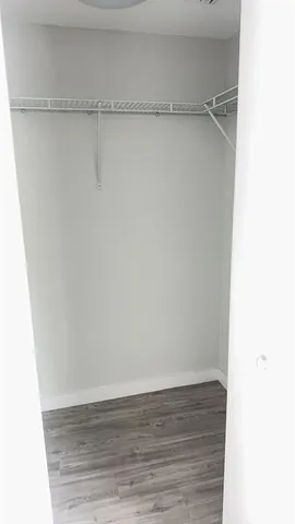 a view of small space with racks on the wall