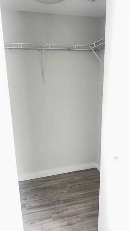 3050 Northwest 68th Street, Unit 2205 Fort Lauderdale, FL 33309 - Photo 16 of 19 a view of small space with racks on the wall