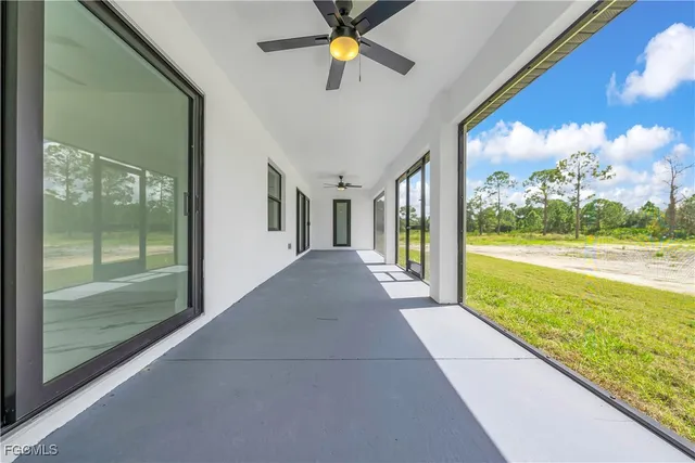 a view of a porch and garden