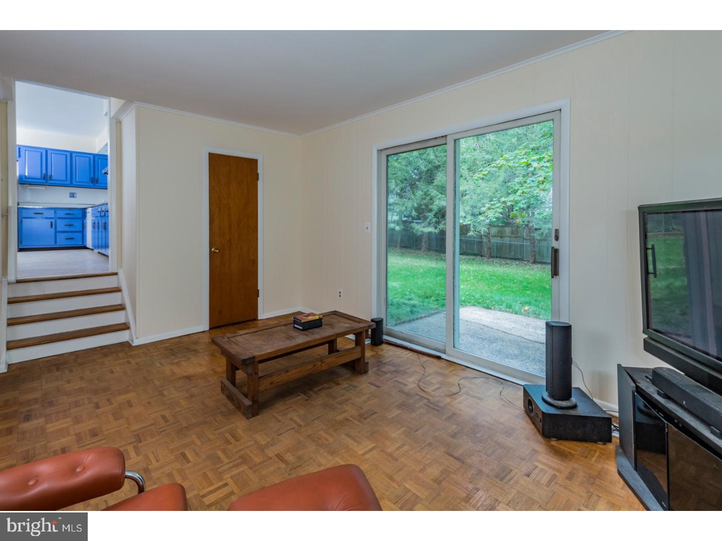 73 Robert Road Princeton, NJ 08540 - Photo 13 of 24 a living room with furniture rug and a large window