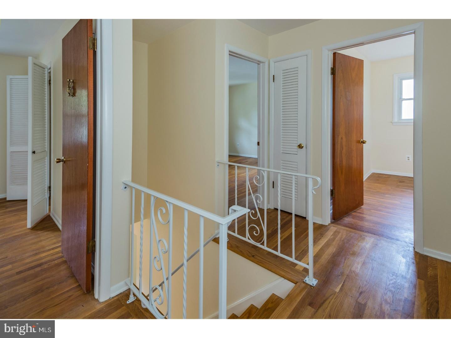 73 Robert Road Princeton, NJ 08540 - Photo 15 of 24 a view of a hallway with wooden floor and staircase