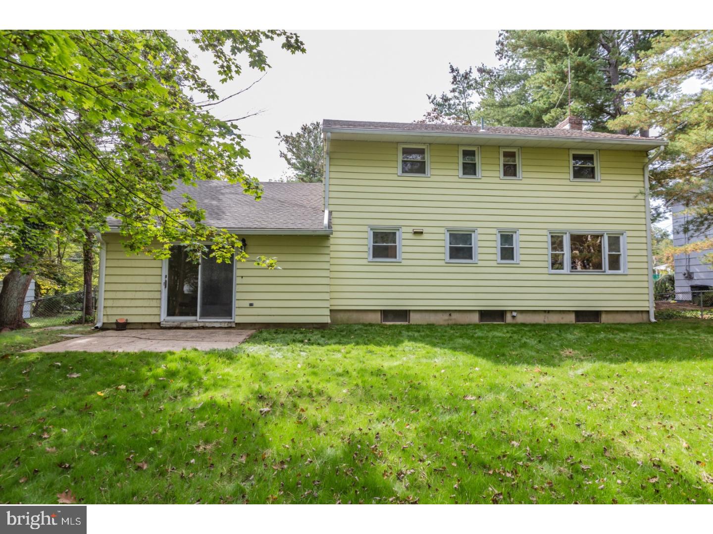 73 Robert Road Princeton, NJ 08540 - Photo 23 of 24 a front view of a house with a garden