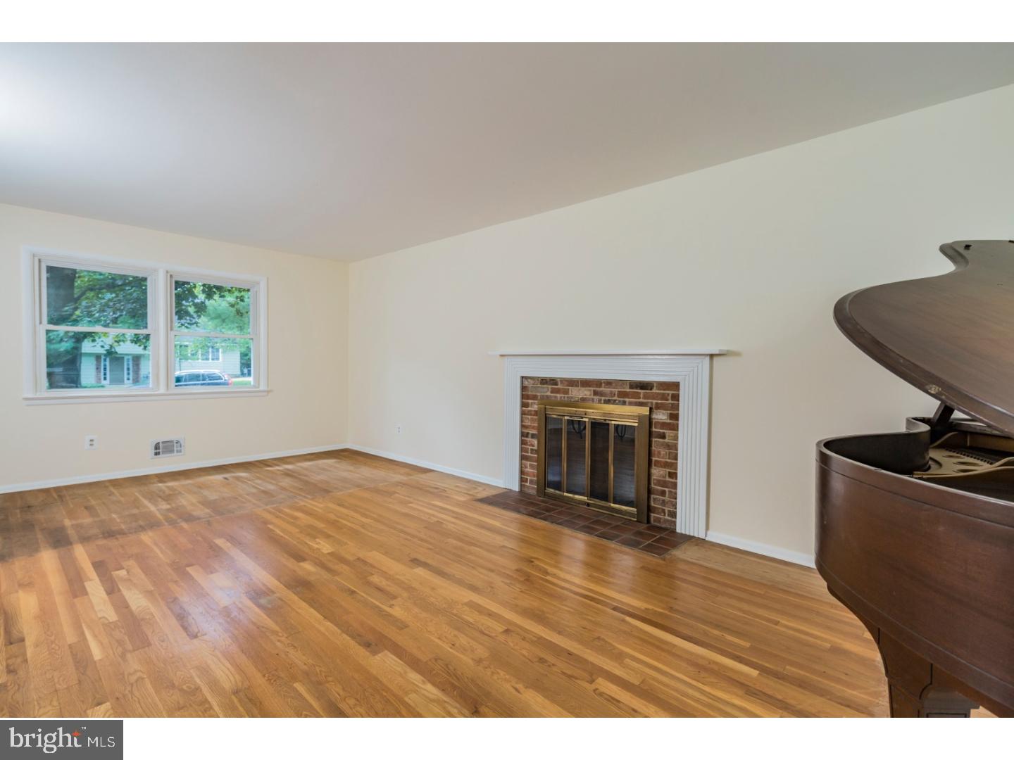 73 Robert Road Princeton, NJ 08540 - Photo 5 of 24 a view of an empty room with a window