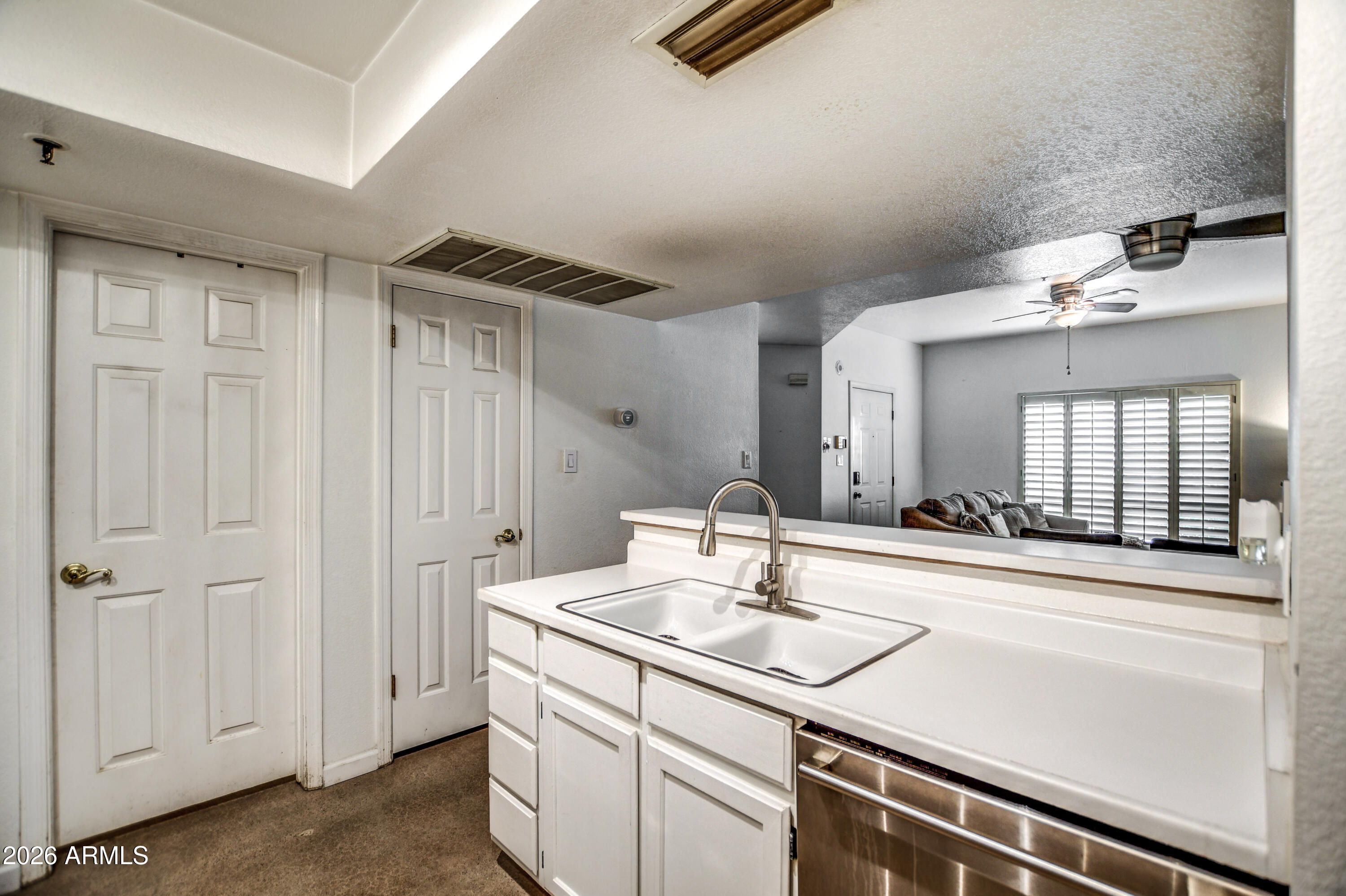 100 East Fillmore Street, Unit 117 Phoenix, AZ 85004 - Photo 13 of 20 a bathroom with a sink and a mirror
