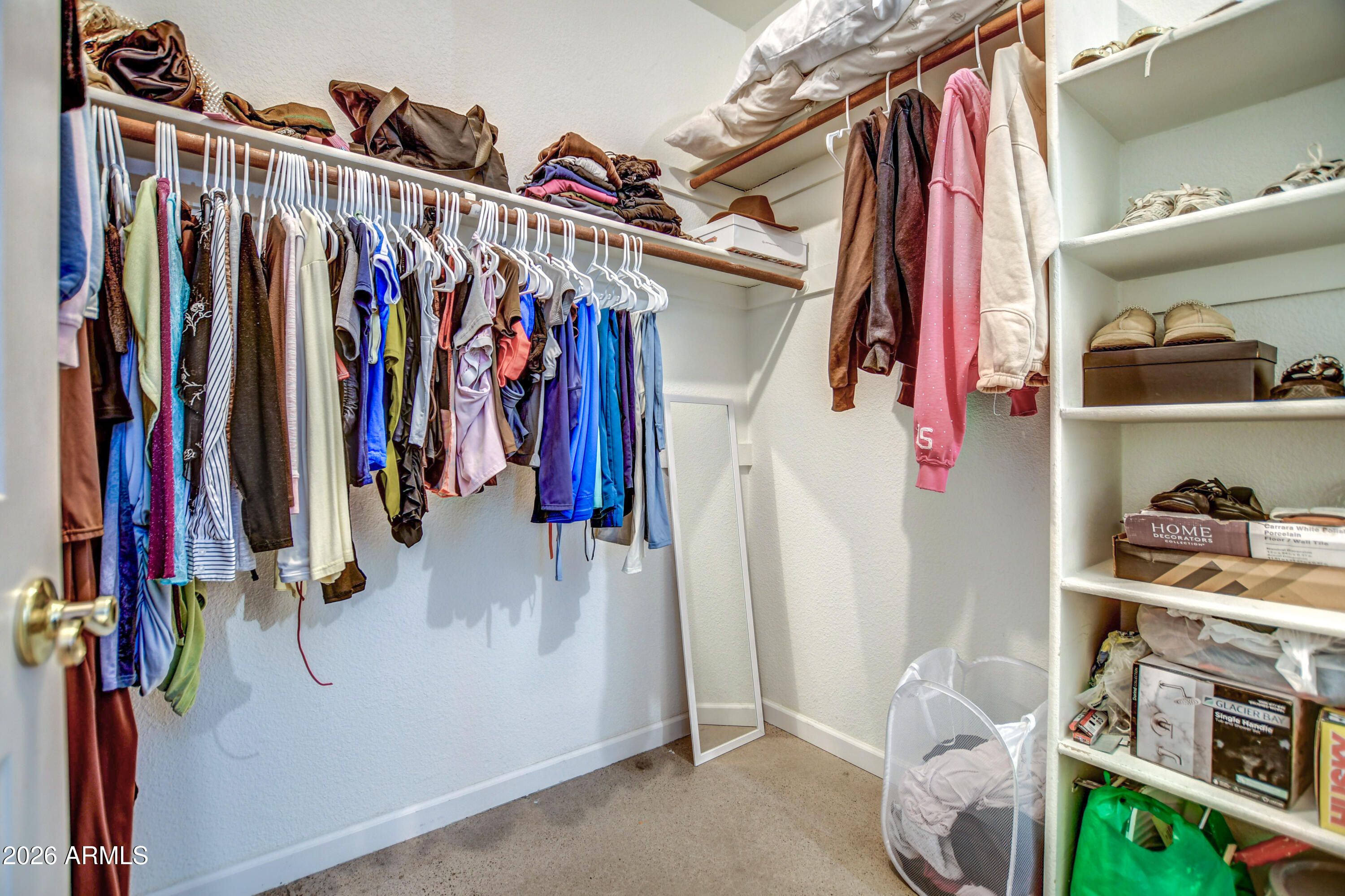 100 East Fillmore Street, Unit 117 Phoenix, AZ 85004 - Photo 20 of 20 a view of walk in closet with clothes and shoes