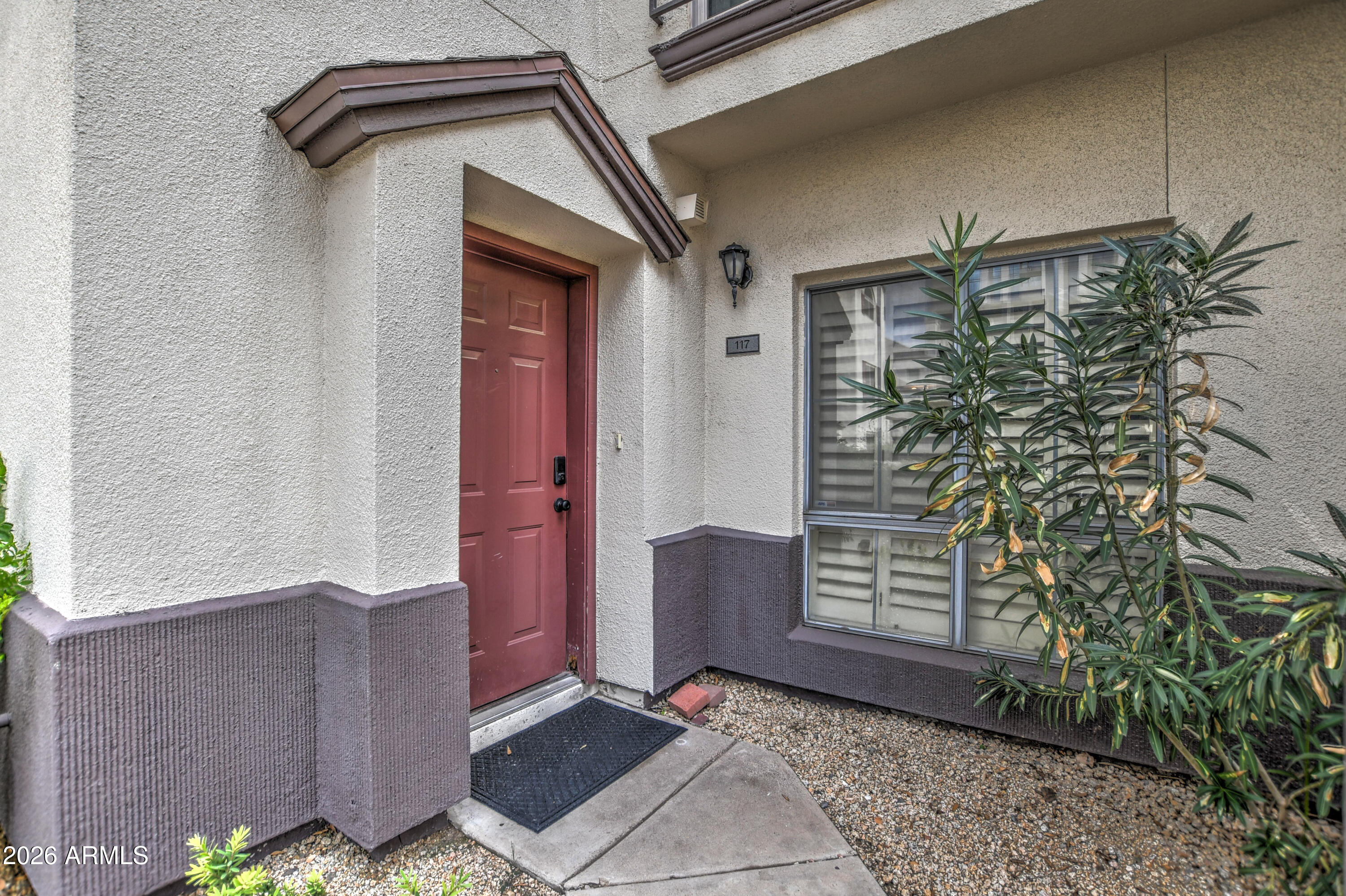 100 East Fillmore Street, Unit 117 Phoenix, AZ 85004 - Photo 4 of 20 a front view of a house