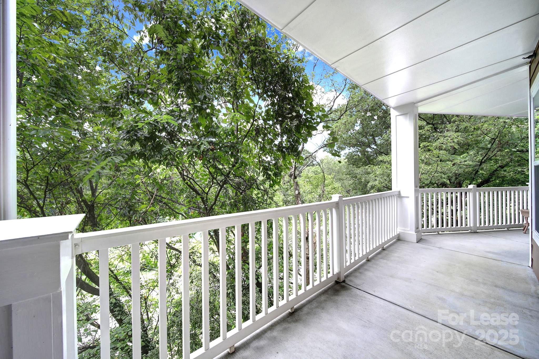 1000 East Woodlawn Road Charlotte, NC 28209 - Photo 11 of 29 a view of a balcony with yard