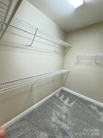 a view of a room with racks on the wall