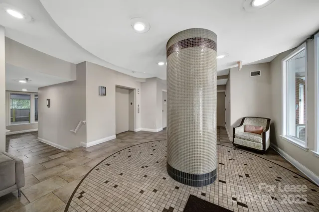 a view of livingroom with furniture and window