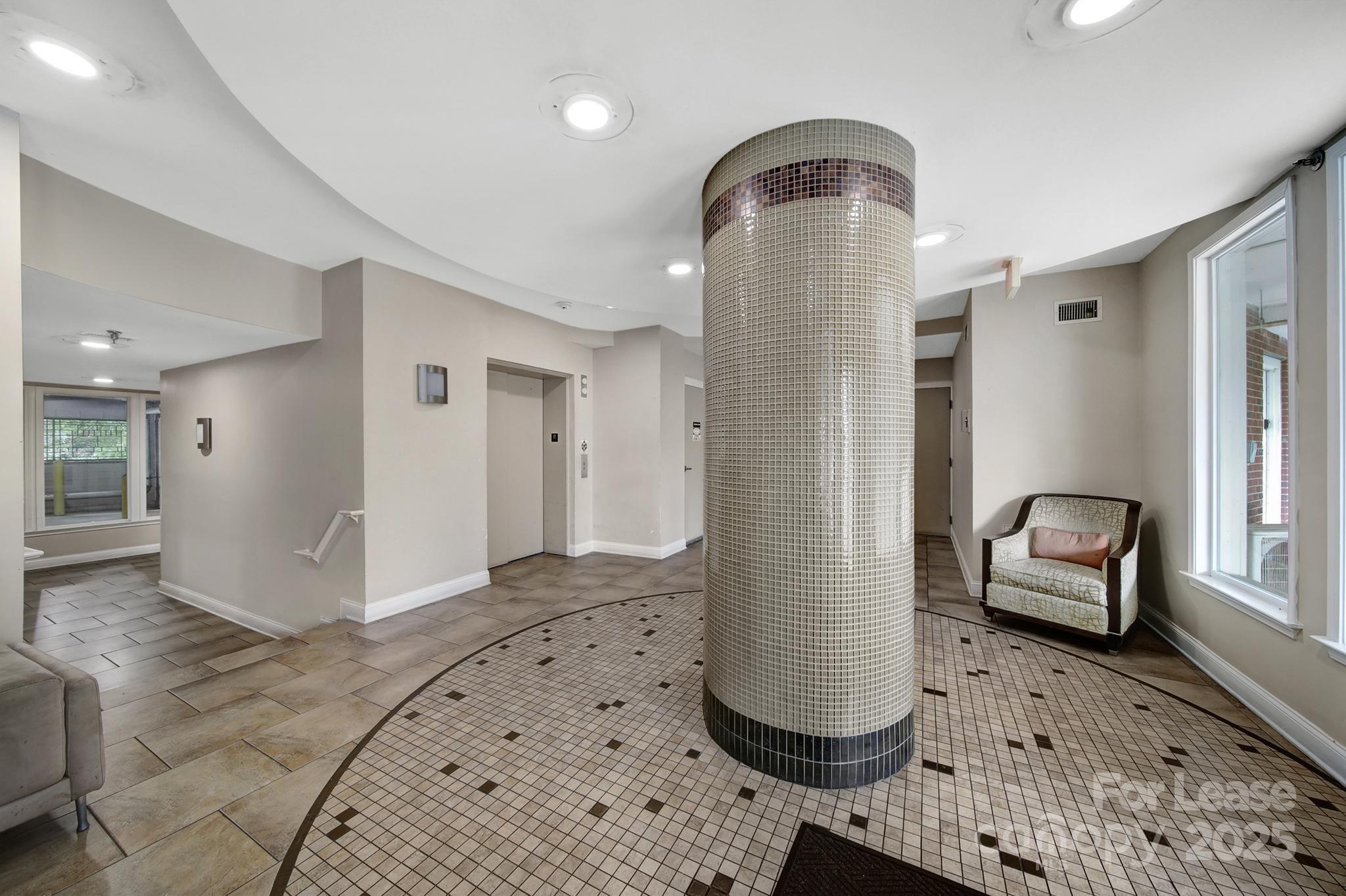 1000 East Woodlawn Road Charlotte, NC 28209 - Photo 3 of 29 a view of livingroom with furniture and window