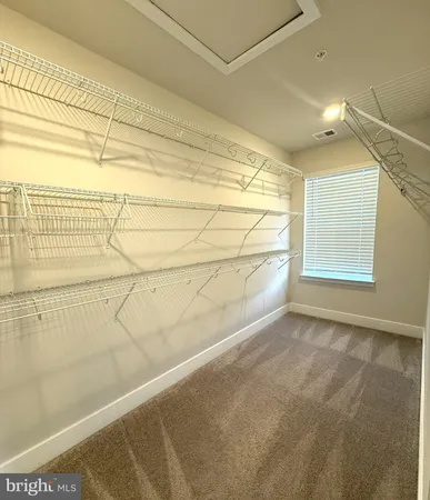 a view of a room with an empty space