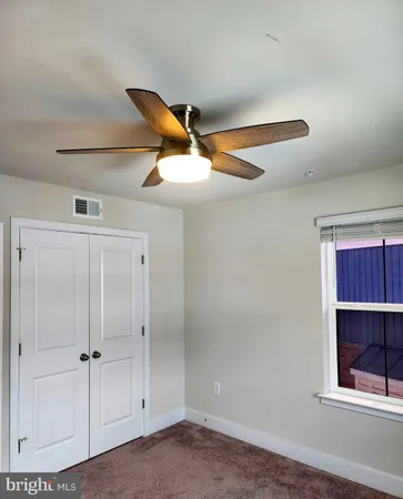 a blue and white kitchen with a sink
