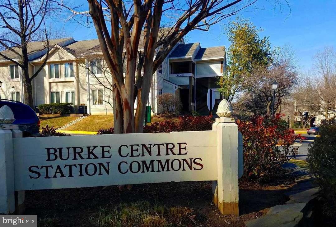 10330 Luria Commons Court, Unit 1B Burke, VA 22015 - Photo 1 of 24 a sign on the side of a building