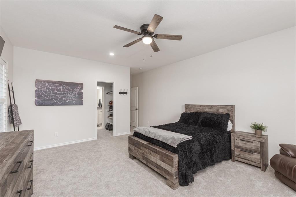400 Prairie Run Aledo, TX 76008 - Photo 18 of 36 a bedroom with furniture and window