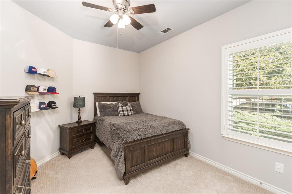 400 Prairie Run Aledo, TX 76008 - Photo 19 of 36 a bedroom with a bed and window