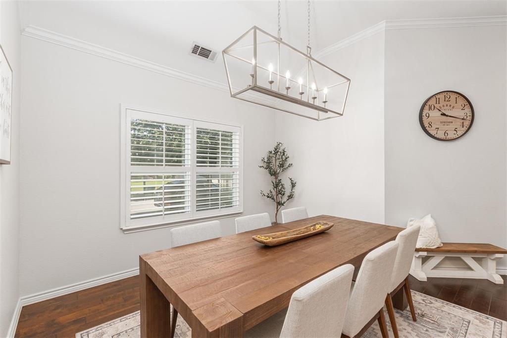 400 Prairie Run Aledo, TX 76008 - Photo 22 of 36 a view of a dining room with a table and chairs