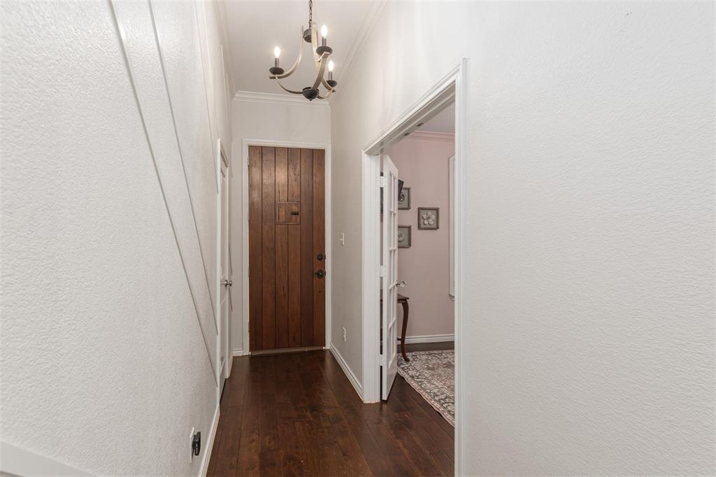 400 Prairie Run Aledo, TX 76008 - Photo 4 of 36 a view of a hallway with wooden floor and closet