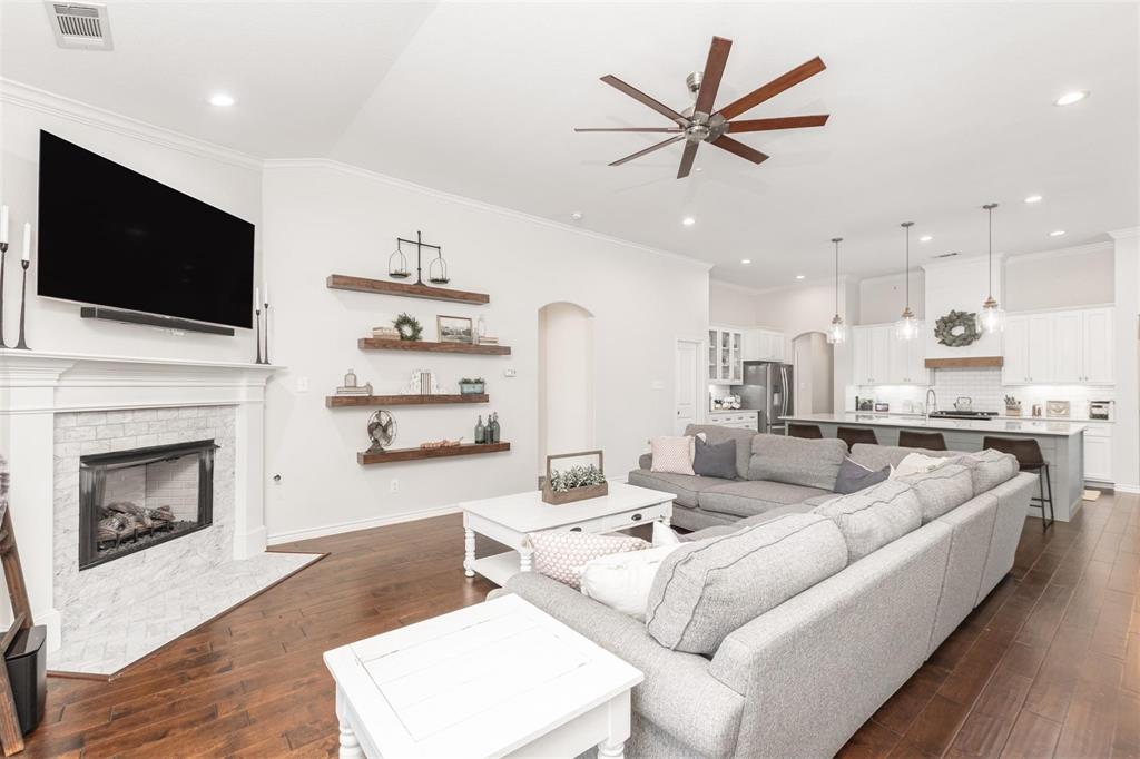 400 Prairie Run Aledo, TX 76008 - Photo 8 of 36 a living room with furniture fireplace and a flat screen tv