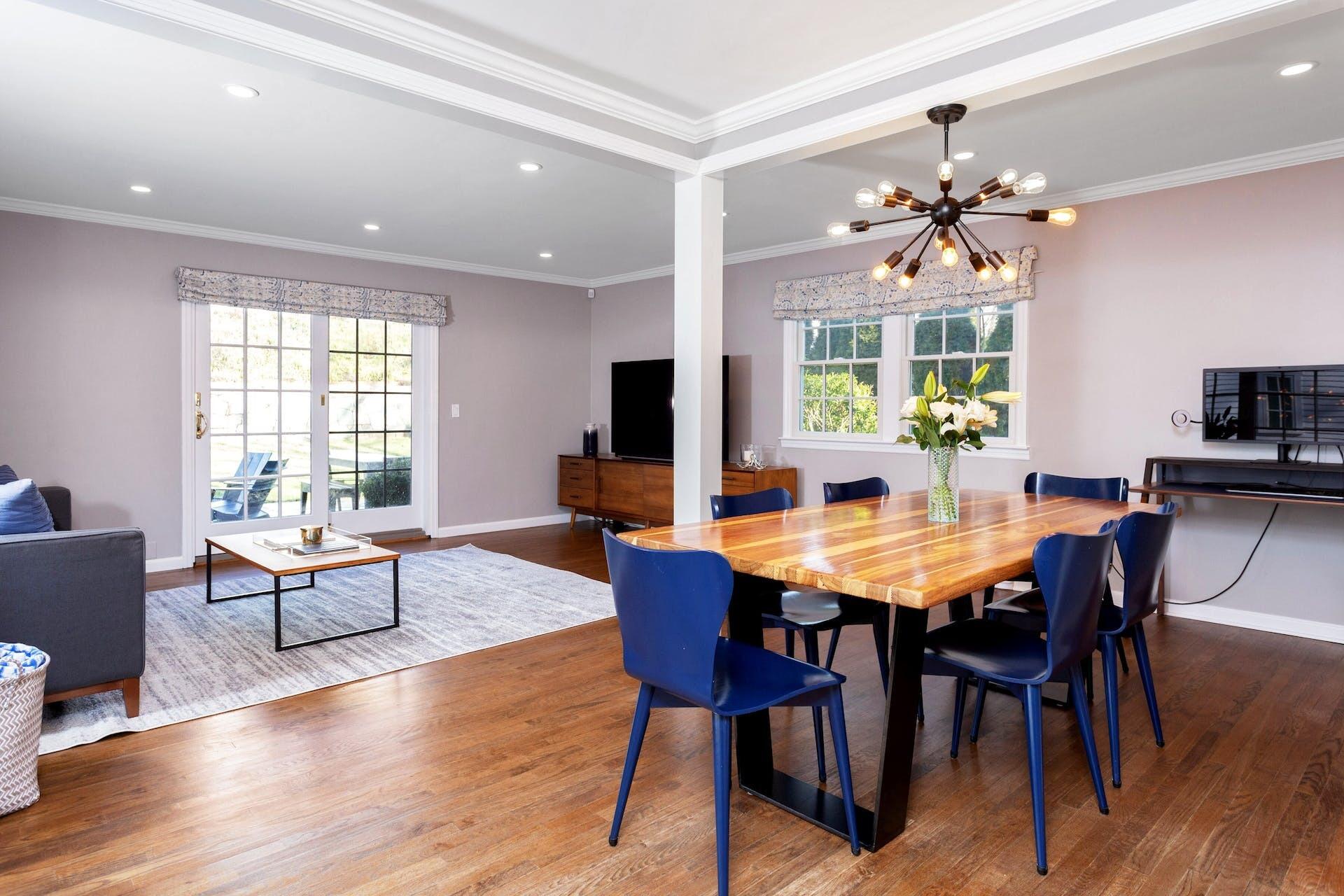 7 Devon Road Darien, CT 06820 - Photo 14 of 29 a view of a dining room with furniture window and wooden floor