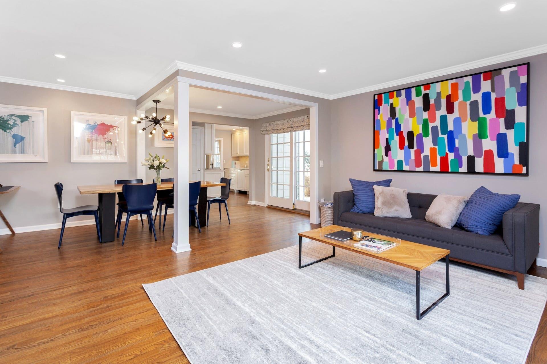 7 Devon Road Darien, CT 06820 - Photo 16 of 29 a living room with furniture a wooden floor and next to a window