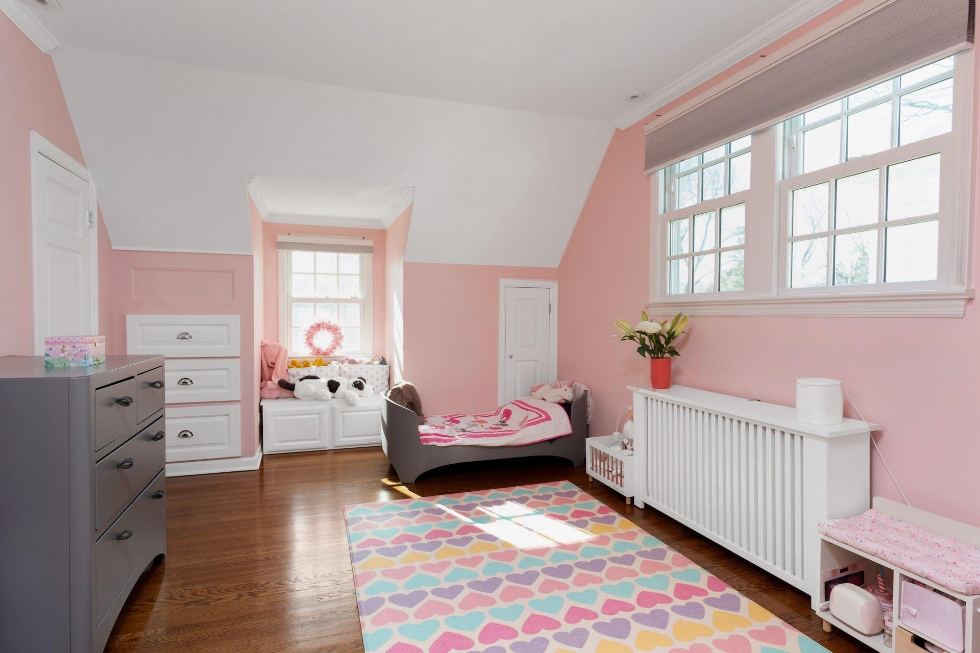 7 Devon Road Darien, CT 06820 - Photo 24 of 29 a bedroom with furniture and a window