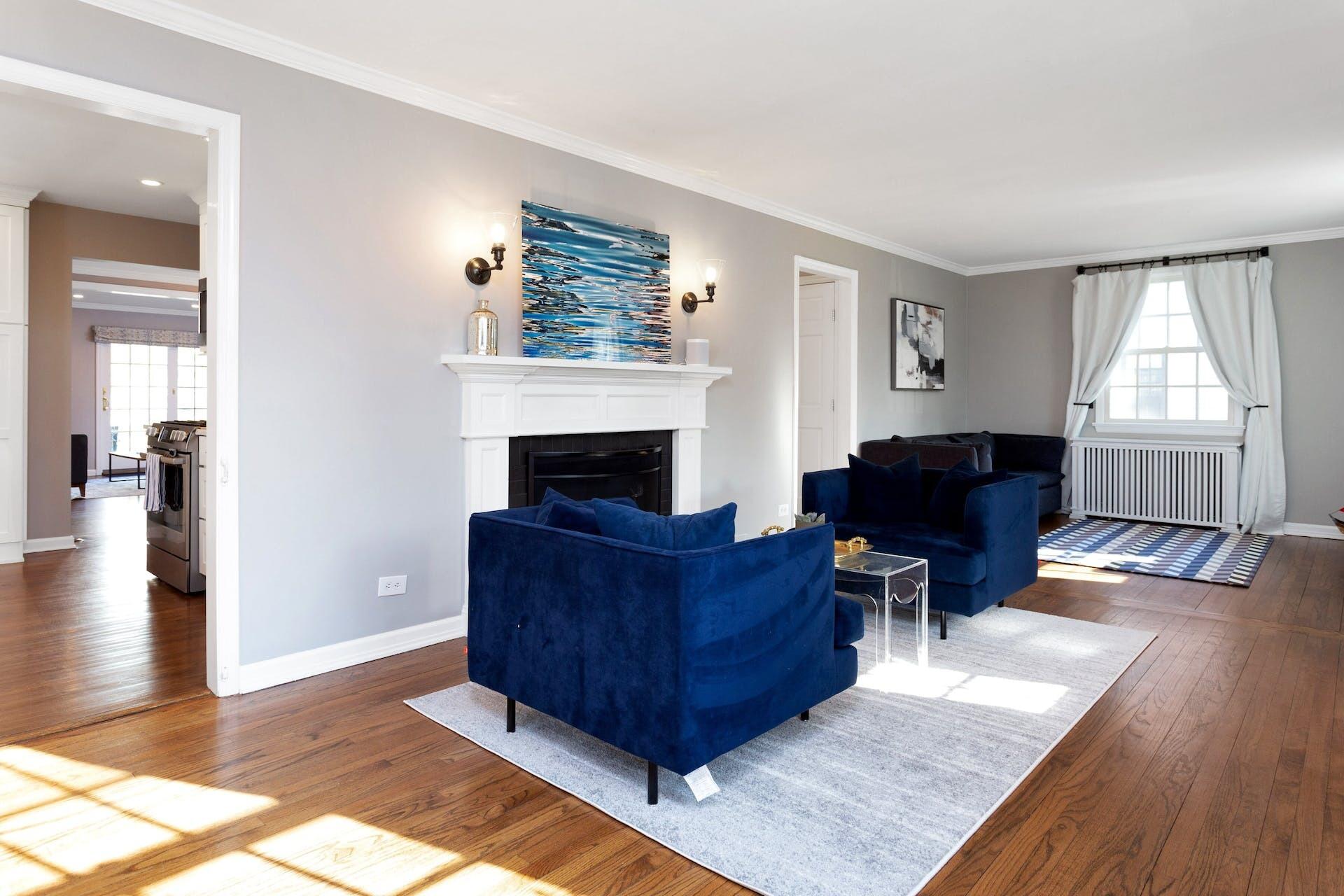 7 Devon Road Darien, CT 06820 - Photo 5 of 29 a living room with furniture and a fireplace