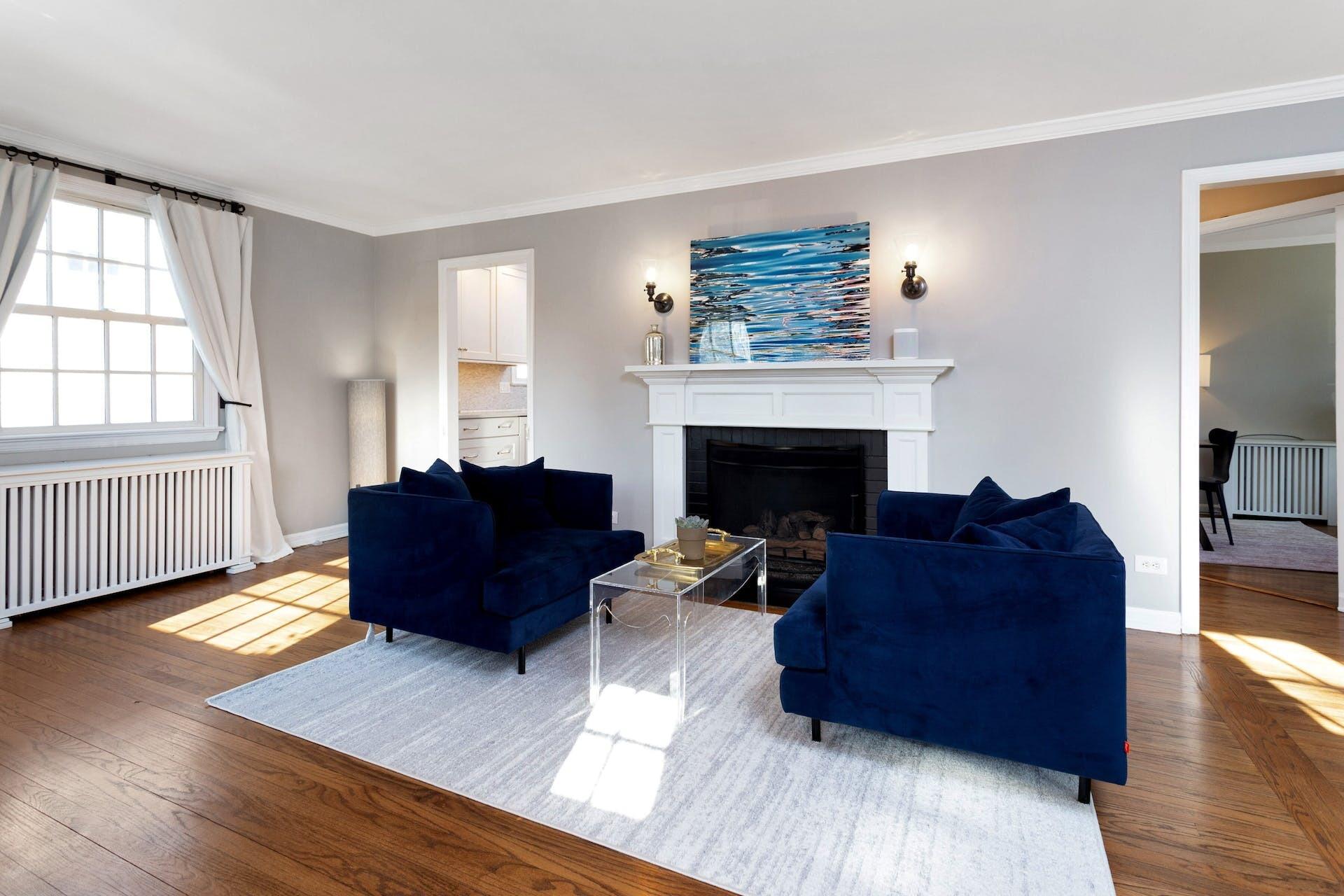 7 Devon Road Darien, CT 06820 - Photo 6 of 29 a living room with furniture and a fireplace