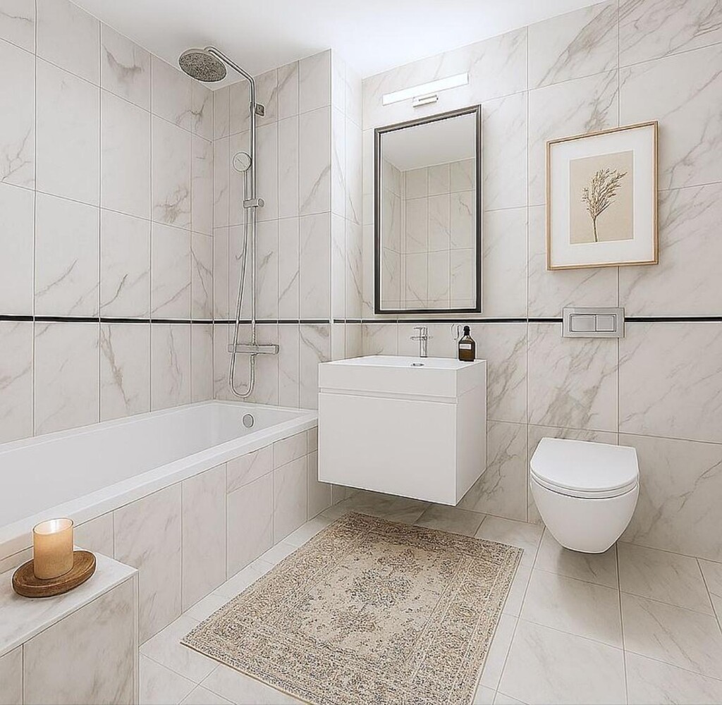 427 East 90th Street, Unit PH9 Manhattan, NY 10128 - Photo 14 of 37 a bathroom with a sink a toilet and bathtub