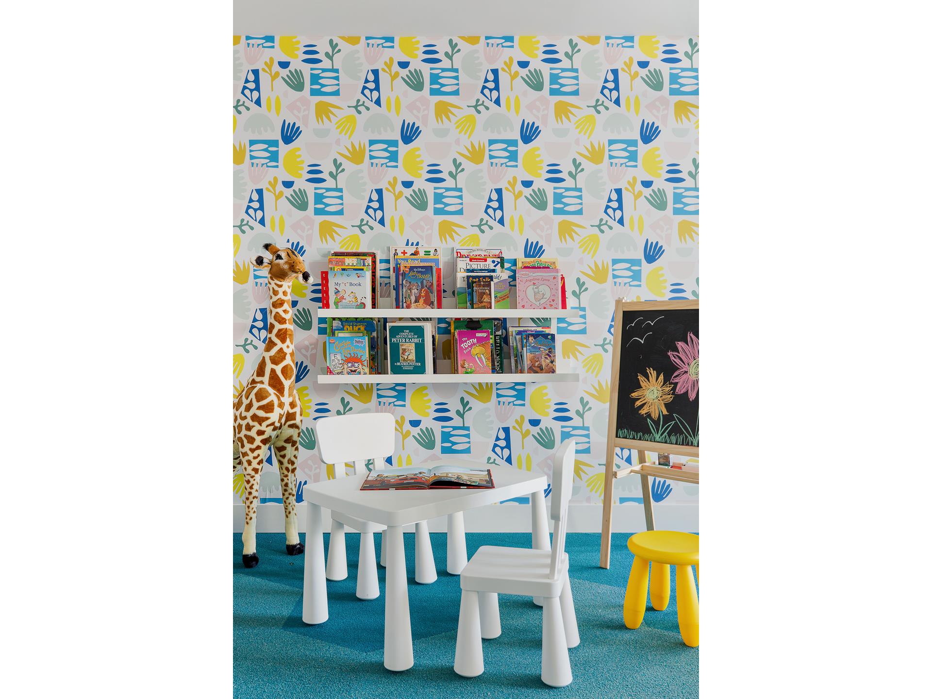 427 East 90th Street, Unit PH9 Manhattan, NY 10128 - Photo 34 of 37 a dining room with furniture and a lamp next to it