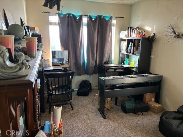 a view of a house with stairs and furniture