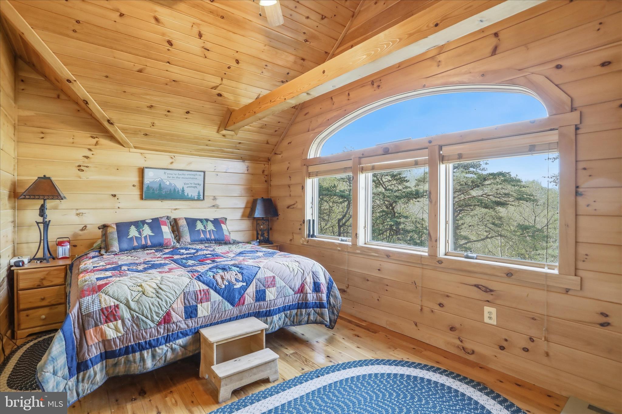 4 Parsons Ridge Road Romney, WV 26757 - Photo 30 of 58 a bedroom with a bed and a large window