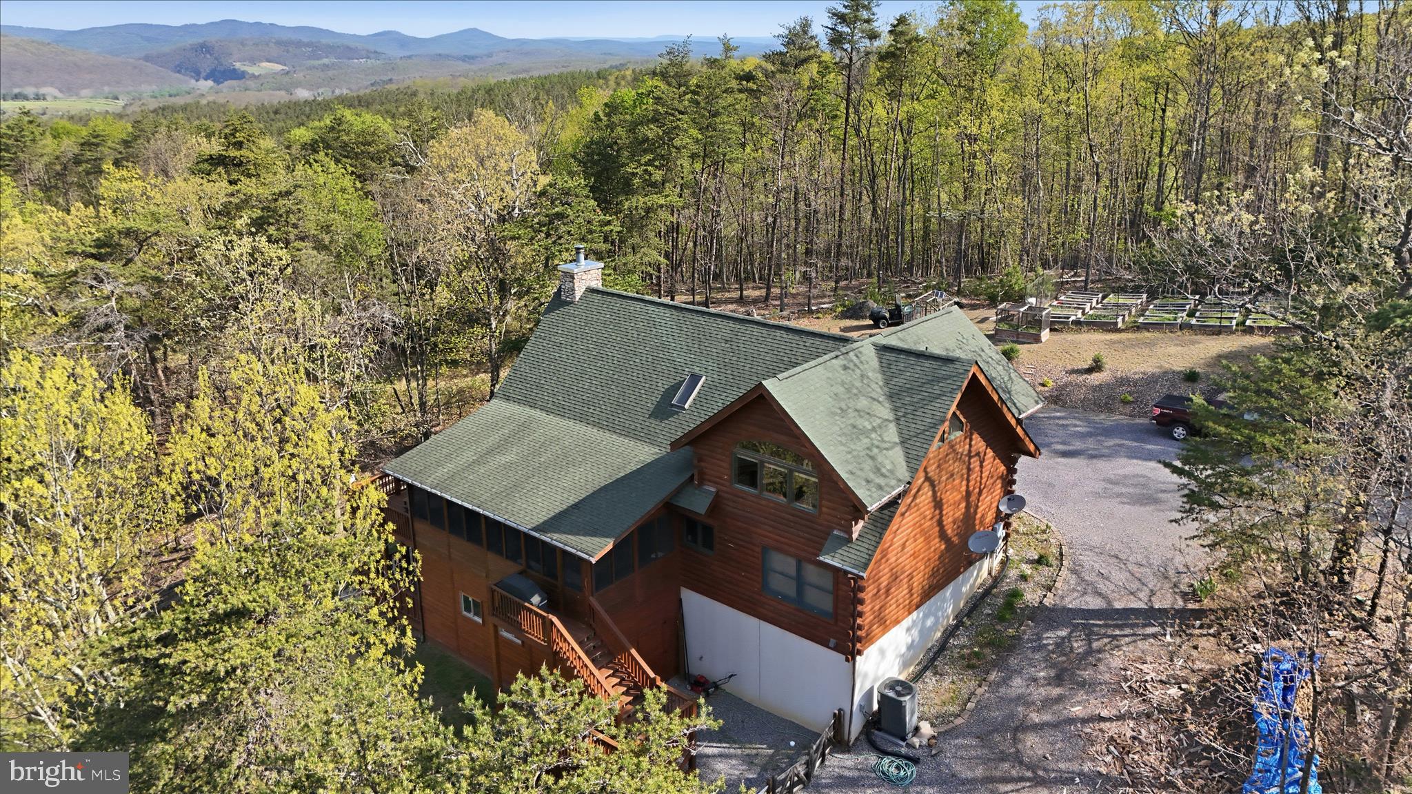 4 Parsons Ridge Road Romney, WV 26757 - Photo 5 of 58 an aerial view of a house with a yard and trees