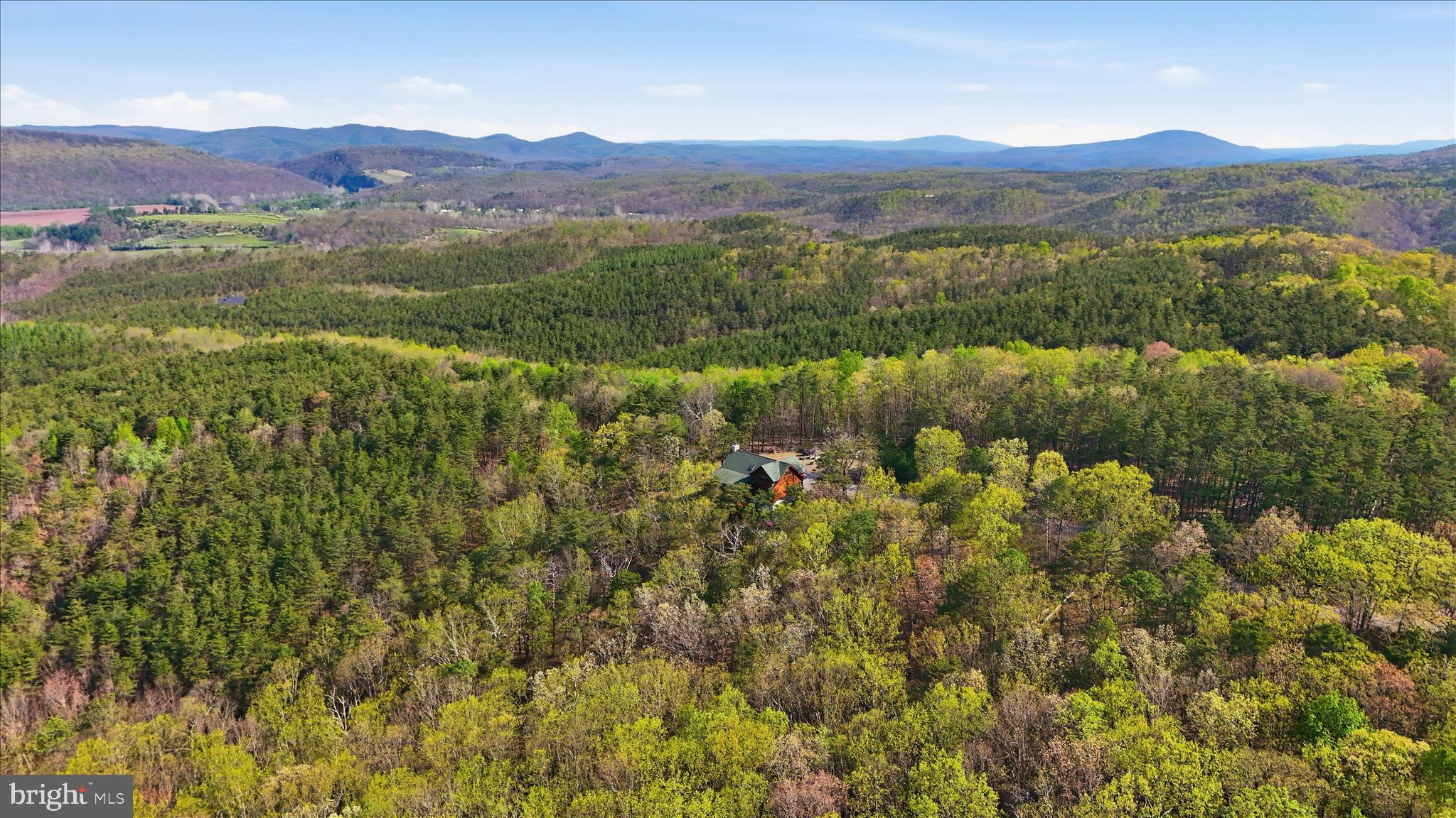 4 Parsons Ridge Road Romney, WV 26757 - Photo 54 of 58 a view of a lush green hillside and houses