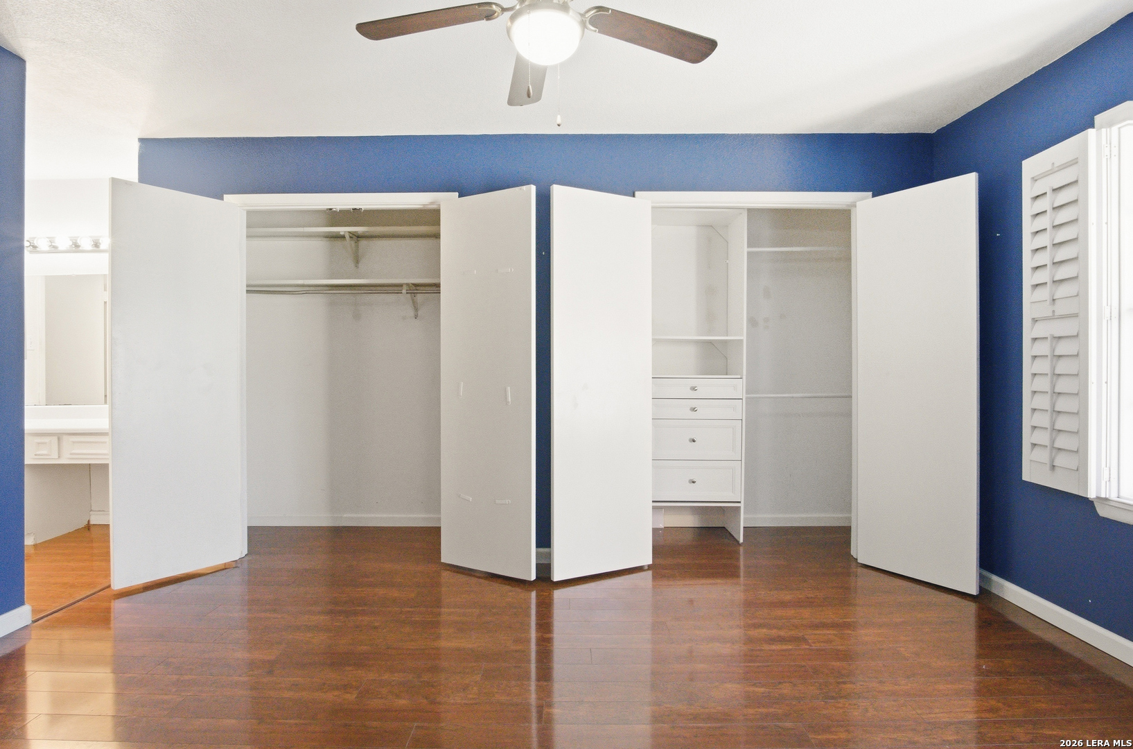 7711 Callaghan Road, Unit 404 San Antonio, TX 78229 - Photo 22 of 39 a view of empty room with wooden floor and cabinet