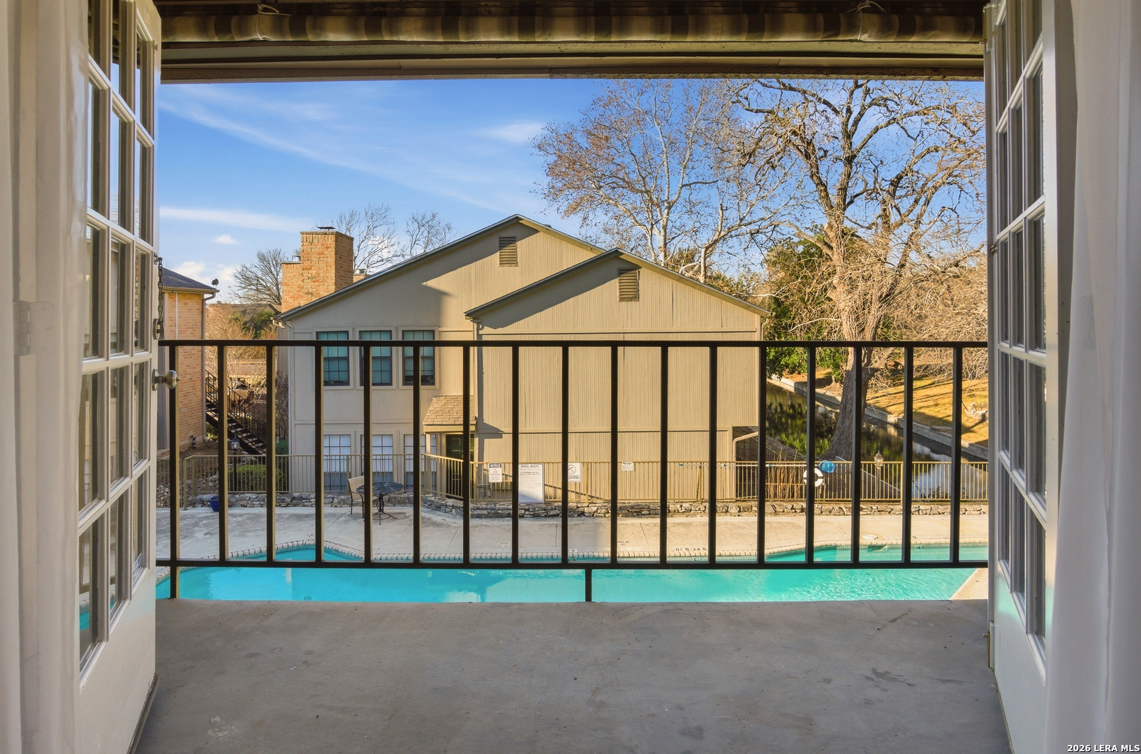 7711 Callaghan Road, Unit 404 San Antonio, TX 78229 - Photo 6 of 39 a view of a backyard