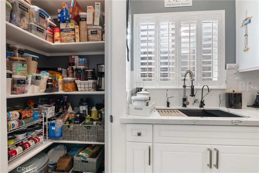 1188 Beach Drive Needles, CA 92363 - Photo 18 of 66 a kitchen with a refrigerator and a sink