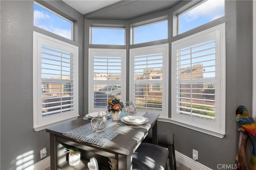 1188 Beach Drive Needles, CA 92363 - Photo 20 of 66 a view of a dining room with furniture and windows