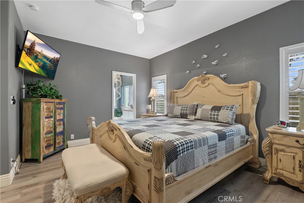 1188 Beach Drive Needles, CA 92363 - Photo 30 of 66 a bedroom with a bed and a flat screen tv