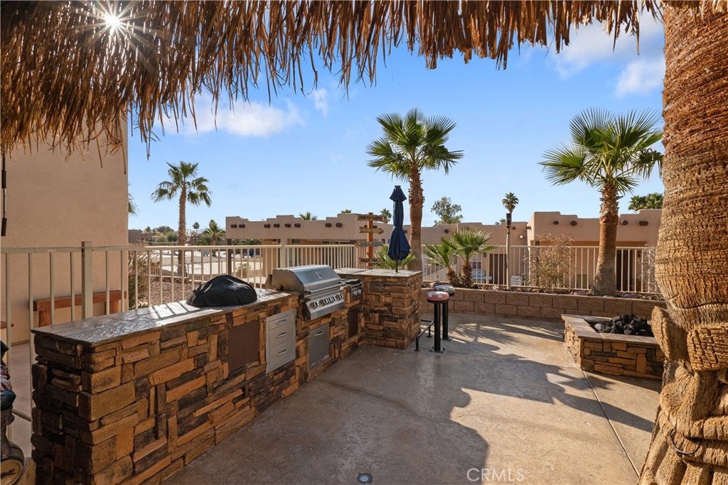 1188 Beach Drive Needles, CA 92363 - Photo 50 of 66 a terrace of a house with outdoor seating