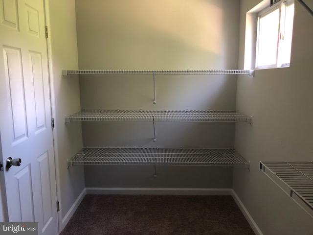 308 Penn Road Pasadena, MD 21122 - Photo 23 of 54 Back side of master closet