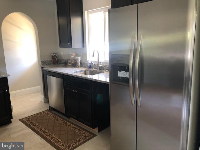 308 Penn Road Pasadena, MD 21122 - Photo 8 of 54 Updated kitchen with stainless steel appliances
