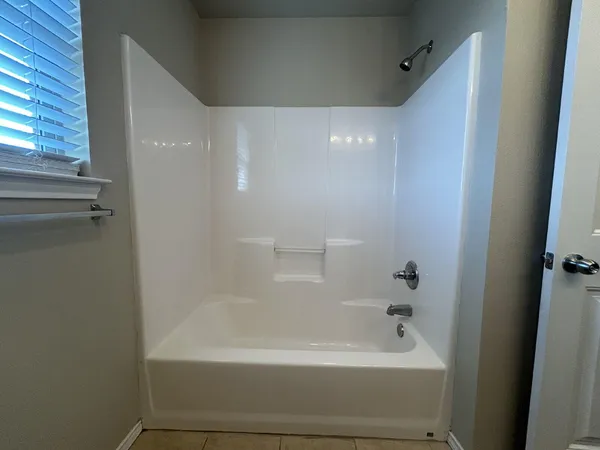 a bathroom with a bathtub